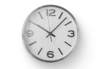 A simple wall clock with a white face and bold black numbers, indicating the time clearly.