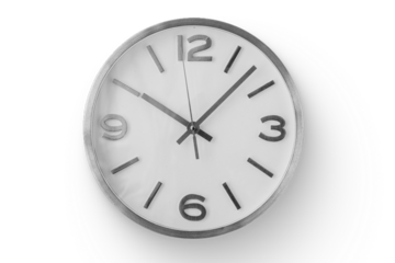 A simple wall clock with a white face and bold black numbers, indicating the time clearly.