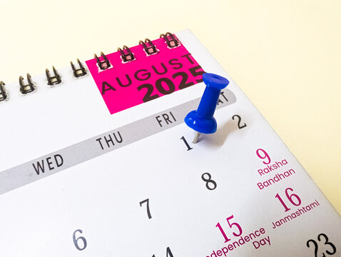 1st August date marked with push pin on calendar 2025