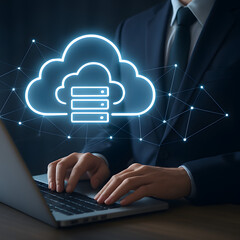 Cloud Computing on Laptop: A businessman's hands hover over a laptop keyboard, a glowing cloud computing icon emerging from the screen, symbolizing digital transformation and connectivity.