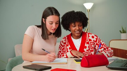 A lively and dynamic study session featuring two dedicated students as they energetically exchange knowledge, take notes, and support each other in their academic pursuits with enthusiasm and