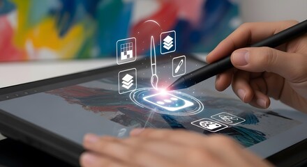A person using a stylus to draw on a digital tablet
