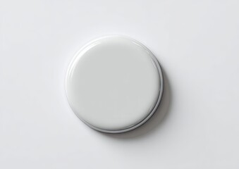 A smooth, off-white, circular disc sits on a plain white background; slightly raised edges; subtle shadow