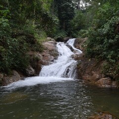 Fototapeta premium Raging waterfall action jungle retreat hdr nature photography scenic view