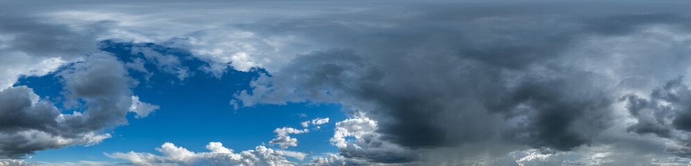 seamless hdri 360 panorama of dark blue sky before sunset with awesome storm clouds for use in 3d...
