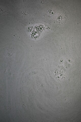 Abstract Soap Bubbles Floating in Grey Water - Minimalist Background Image