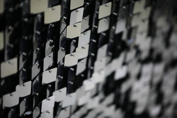 Close-up of Black and Silver Geometric Pattern Reflective Surface Background