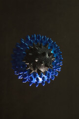Abstract Representation of Virus and Bacteria in Black and Blue on Dark Background