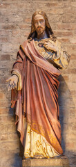 Fototapeta premium PIACENZA, ITALY - MAY 20, 2025: The carved polychrome staue of Heart of Jesus in the church Basilica di San Antonio by unknown artist of 19. cent.