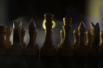 Captivating Chess Pieces in a Dramatic Misty Setting Highlighting Strategy and Tactics