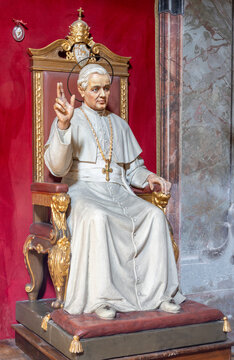 LODI, ITALY - MAY 21, 2025: The carved polychrome statue of St. pope Pius X in the chruch Chiesa di San Filippo Neri by unknown artist of 20. cent .