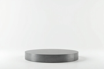 Side view of an empty titanium round podium with smooth metallic texture, set against a pure white background