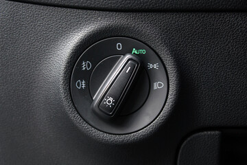 Switch of light and headlights. Headlight and fog-lamp controlling stick in car. Turn signal lever,...