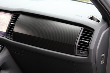 Glove compartment and airbag in interior of new car. Car ventilation system. Car air vent for air...