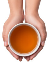 A pair of hands holding a cup filled with amber liquid. Png, Transparent background.