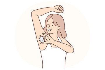 Woman raising hand using deodorant during morning hygiene routine to avoid sweat and odor