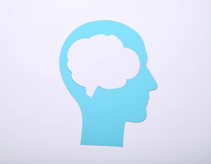 Paper-cut silhouette of a head isolated on white 