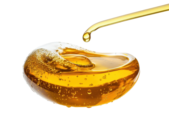 Drops of vegetable oil isolated on a white background create a captivating visual with unique shapes and reflections that emphasize the oil's smooth and glossy texture