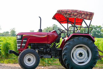 tractor standing at agricultural field