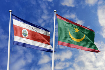Costa Rica and Mauritania flags proudly waving against a vibrant blue sky, symbolizing...