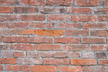 Weathered red brick wall texture. Background.