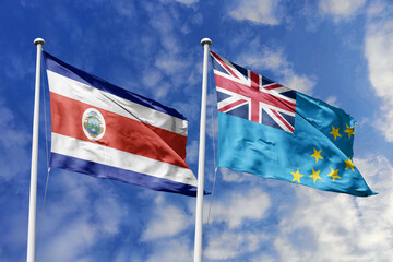 Costa Rica and Tuvalu National Flags Waving Gracefully Against a Bright Blue Sky, Symbolizing Diplomatic Bonds and Shared Aspirations.