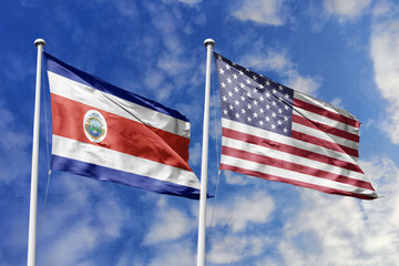 Flags of Costa Rica and the United Kingdom Waving Together Under a Bright Blue Sky, Symbolizing Diplomatic and Historical Ties.