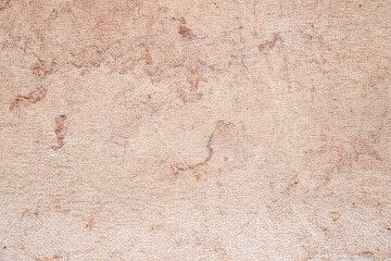 Textured Beige Plaster Wall Background with Cracks and Natural Patterns