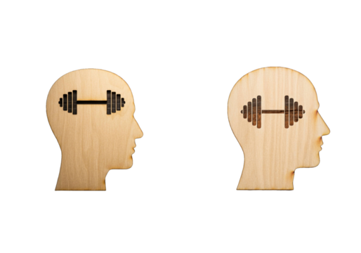 Mental Strength Concept with Dumbbell in Wooden Human Head Silhouette.