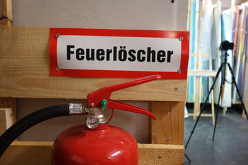 a fire extinguisher to extinguish a fire