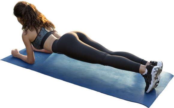 A young slim athletic girl in sportswear with snakeskin prints performs a set of exercises. Fitness and healthy lifestyle.