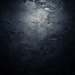 Dark Textured Surface with Subtle Light Reflection in Background