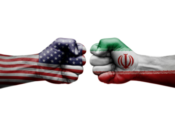 USA vs Iran Conflict Concept with Painted Clenched Fists on Black Background.