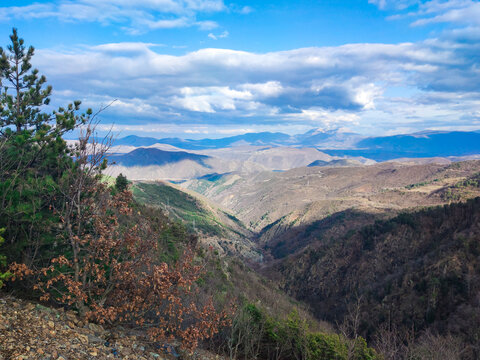 Mountain Landscape near Fierza, Albania, valley view with Forest and Distant Peaks