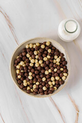 chocolate cereal flakes balls with milk