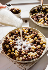 chocolate cereal flakes balls with milk