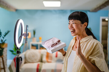 Japanese woman live streaming and show natural jade stone roller