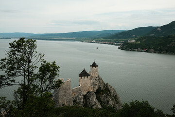 Aerial view of Golubac Fortress on a cliff above the Danube River in Serbia. Popular tourist...