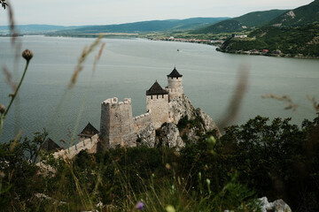 Aerial view of Golubac Fortress on a cliff above the Danube River in Serbia. Popular tourist...