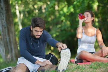 couple stretching outdoors