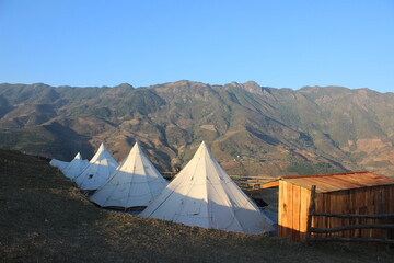 Mountain Campsite with Bell Tents