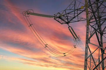 high voltage power lines in sunset
