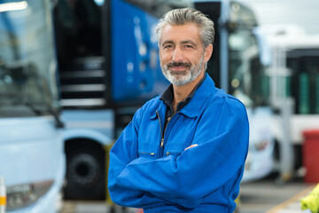 a bus mechanic at work