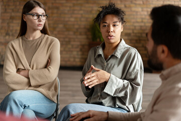 Patients are talking during group therapy session with psychologist