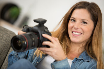 blond girl recording video for blog