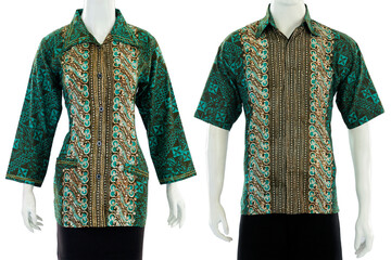 Batik couple outfit in green with a blouse cut for women and short sleeve shirts for men.