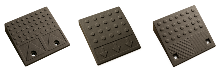 Set of tactile curb ramp plates in brown finish with raised dot patterns and warning indicators on transparent background