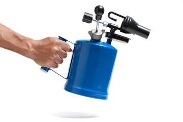 Hand holding blue blowtorch, highlighted on white background.