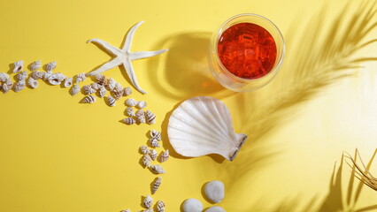 Arranged flat lay of summer beach holiday concept with cold refreshing summer beverage strawberry...