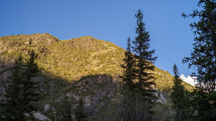 Kyrgyzstan, Ala-Archa park. Mountains landscape at sunset